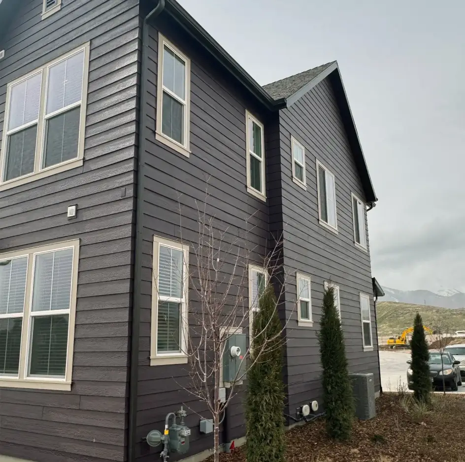 view of utah home with vinyl siding5k gutter